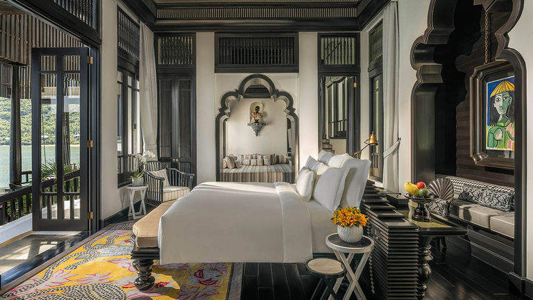 Guestrooms at InterContinental Danang Sun Peninsula Resort blend Vietnamese lanterns and temple-inspired architecture with French flair.